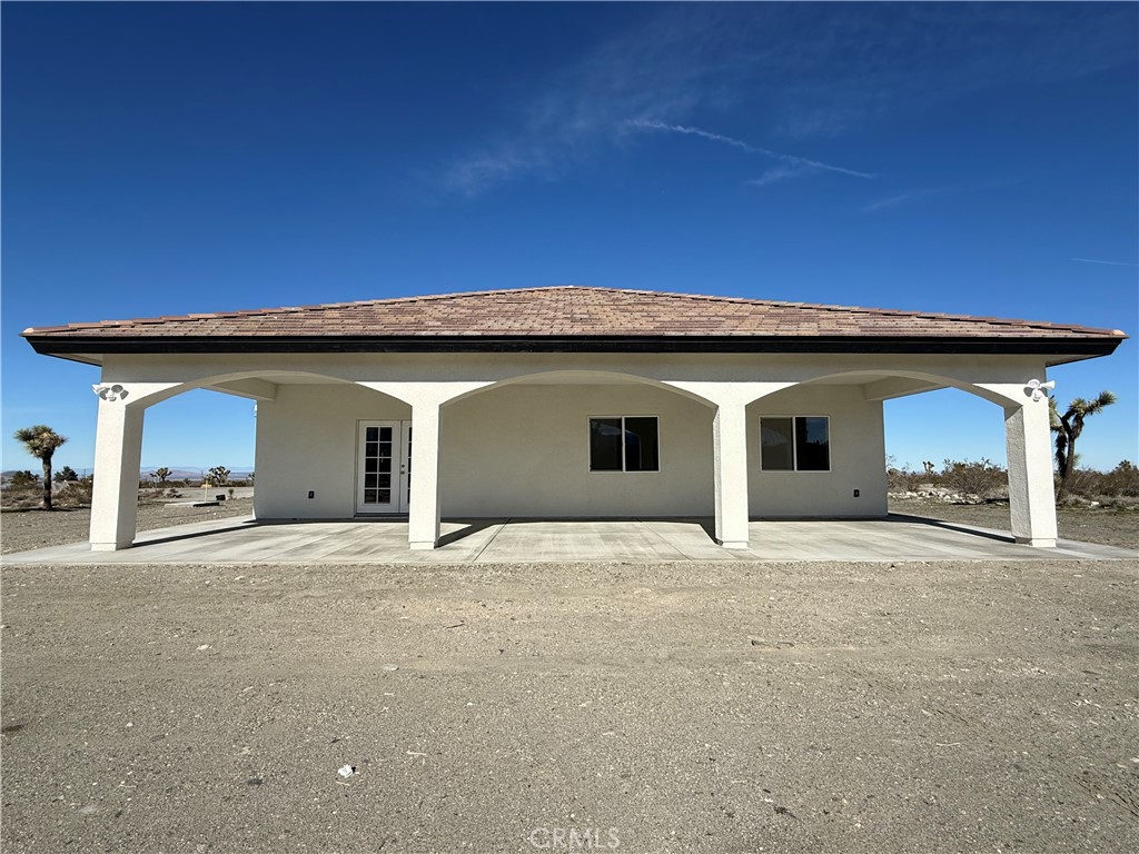 2115 Seville Place Pinon Hills, CA 92372 - Photo 8 of 31 a view of a house with a outdoor space