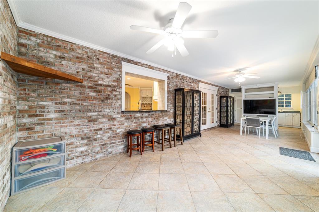 9080 Southwest 19th Avenue Road Ocala, FL 34476 - Photo 20 of 100 a lobby with furniture and a flat screen tv