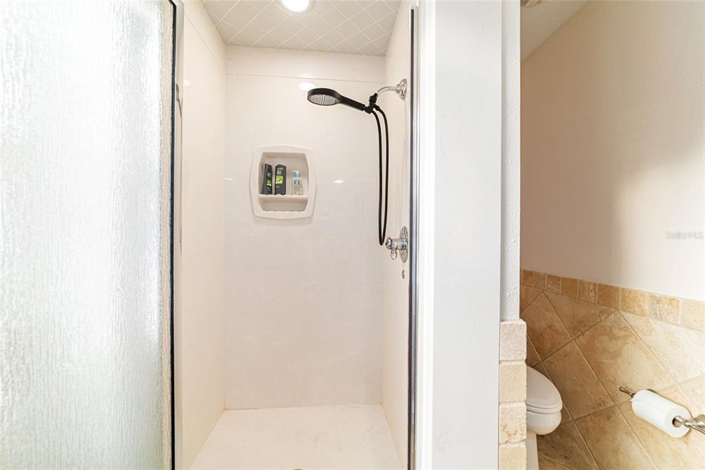 9080 Southwest 19th Avenue Road Ocala, FL 34476 - Photo 44 of 100 a bathroom with a shower and a toilet