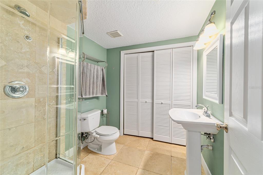 9080 Southwest 19th Avenue Road Ocala, FL 34476 - Photo 57 of 100 a bathroom with a sink toilet and shower