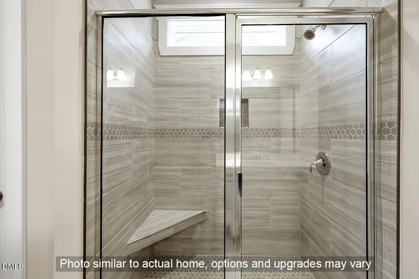 an empty room with windows and entrance