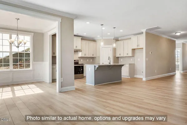 a view of kitchen with wooden floor