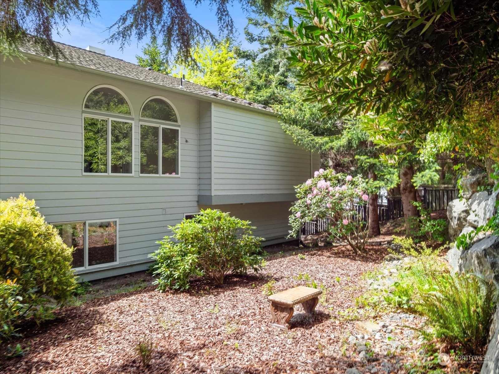 4191 Islander Way Anacortes, WA 98221 - Photo 35 of 40 a front view of a house with a yard