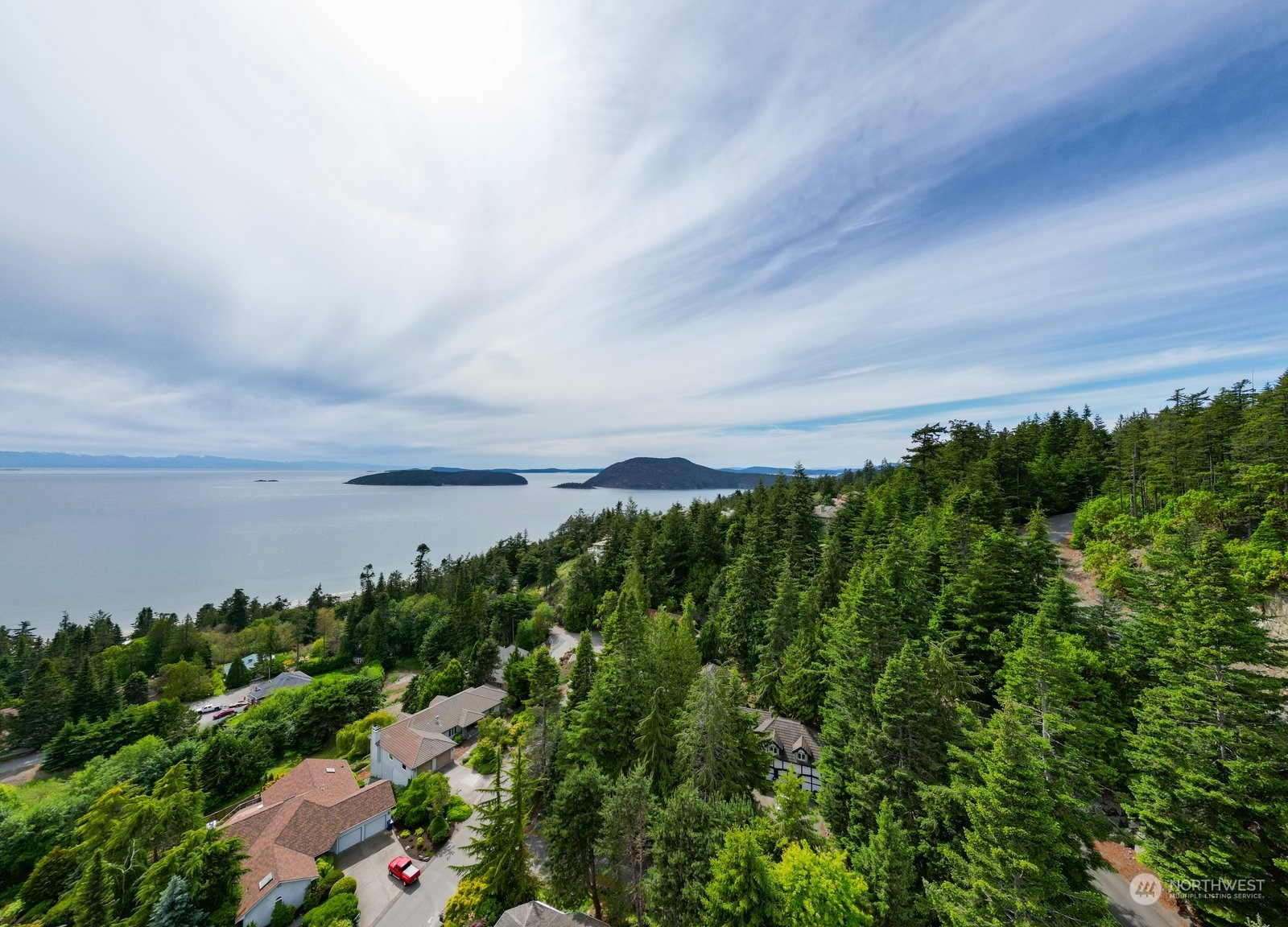 4191 Islander Way Anacortes, WA 98221 - Photo 38 of 40 a view of a lake with a yard