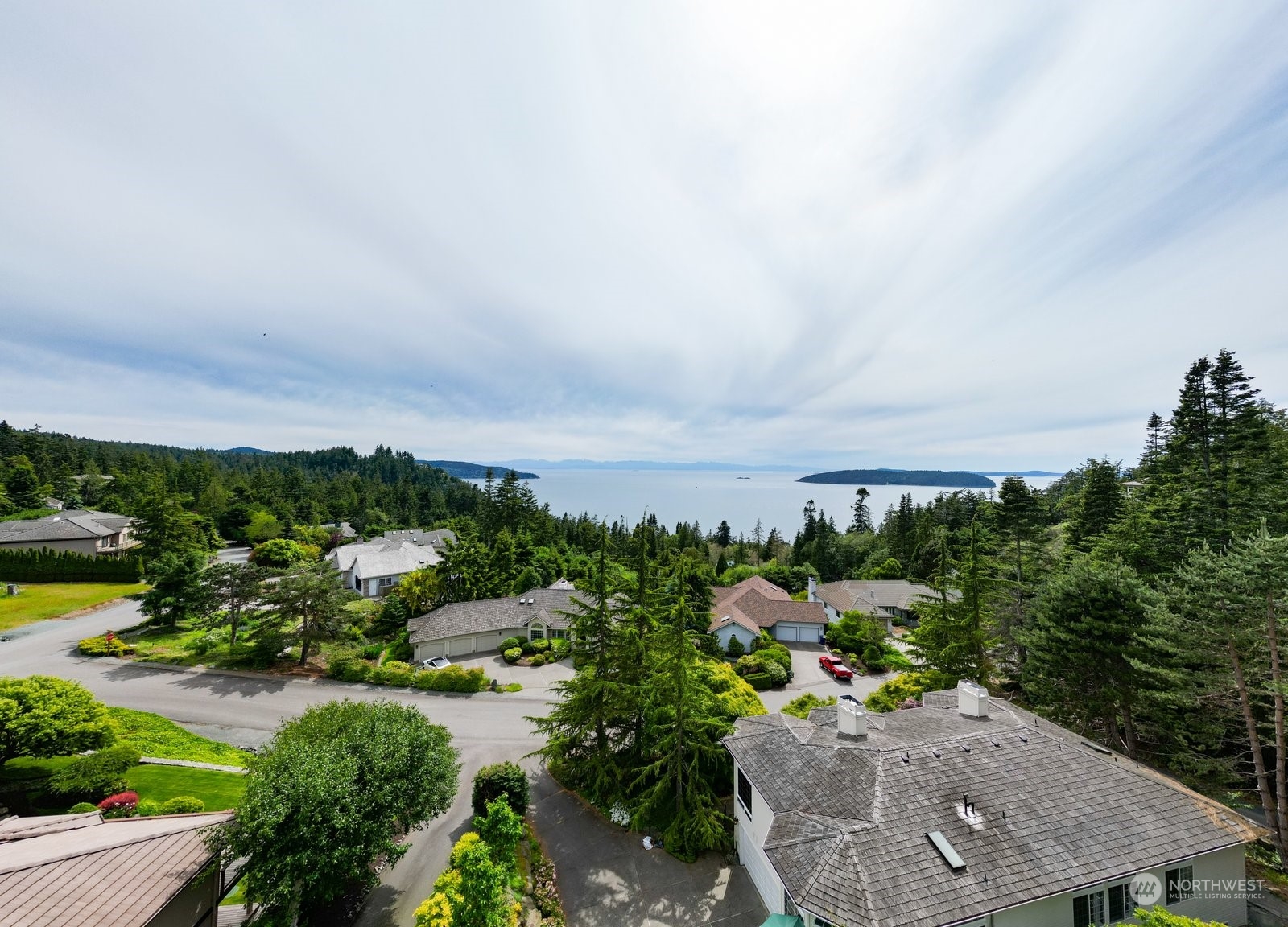 4191 Islander Way Anacortes, WA 98221 - Photo 40 of 40 a view of a houses with a yard and potted plants
