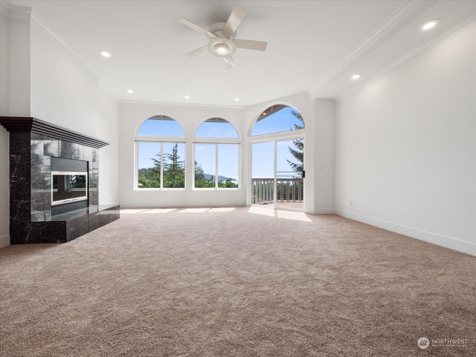 4191 Islander Way Anacortes, WA 98221 - Photo 8 of 40 a view of open kitchen with a sink and a fireplace