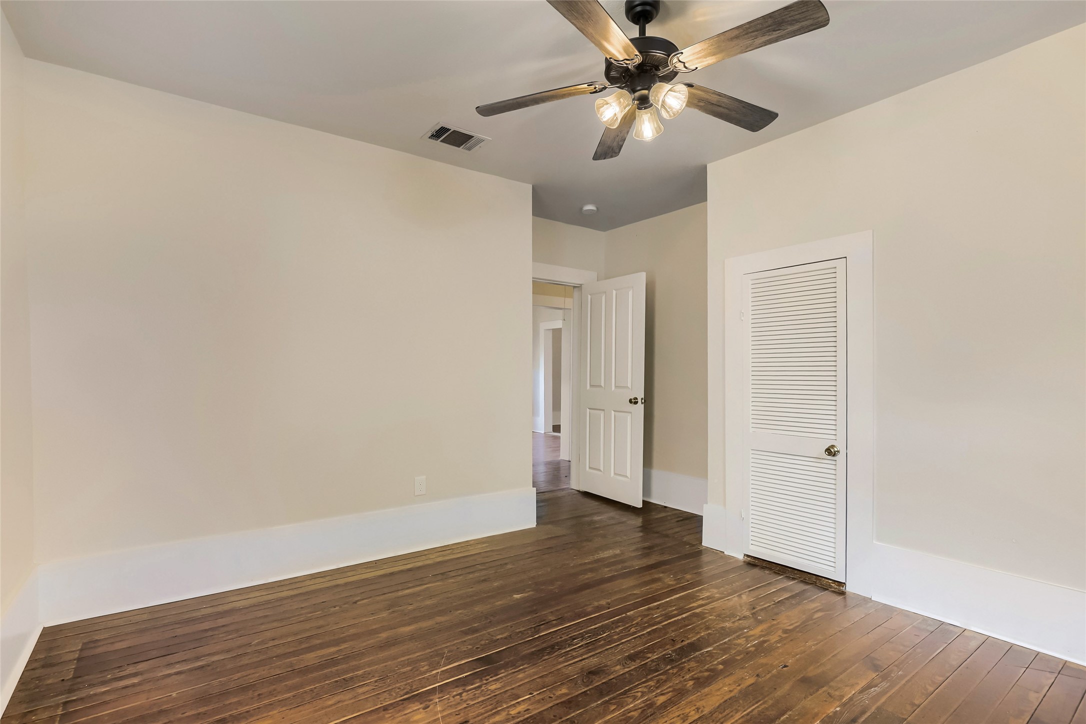 208 North Ave B Elgin, TX 78621 - Photo 18 of 29 Looking out of bedroom 1 into hall.
