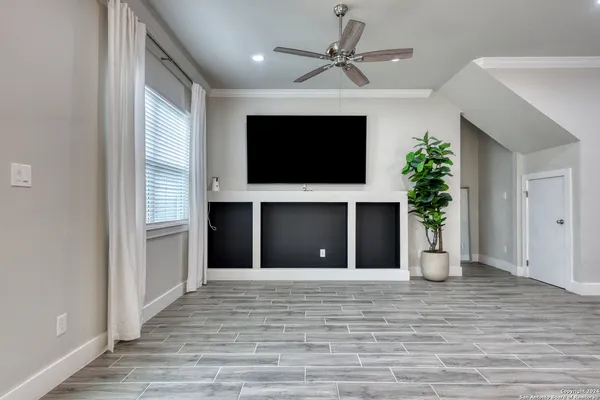 a view of a livingroom with a flat screen tv