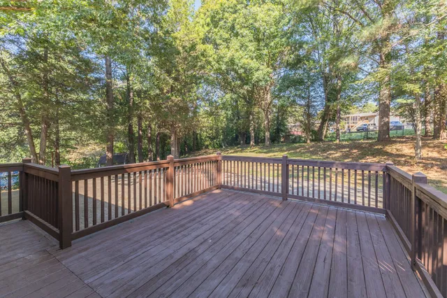 a view of a wooden roof deck