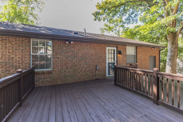 a view of outdoor space with deck and wooden floor