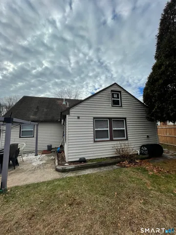 a backyard of a house with lots of green space