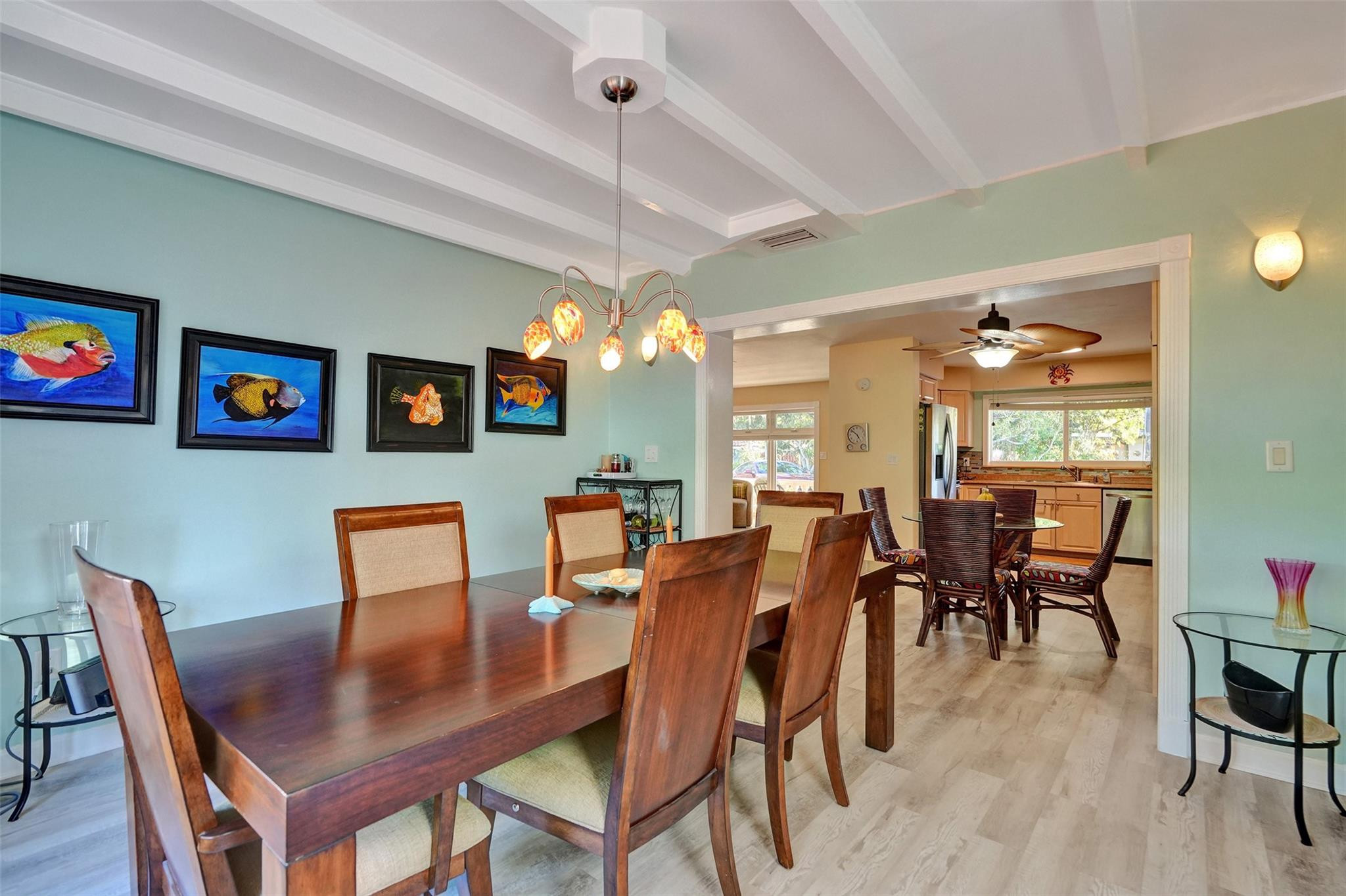 2585 Southeast 3rd Street Pompano Beach, FL 33062 - Photo 18 of 71 a dining room with furniture and window