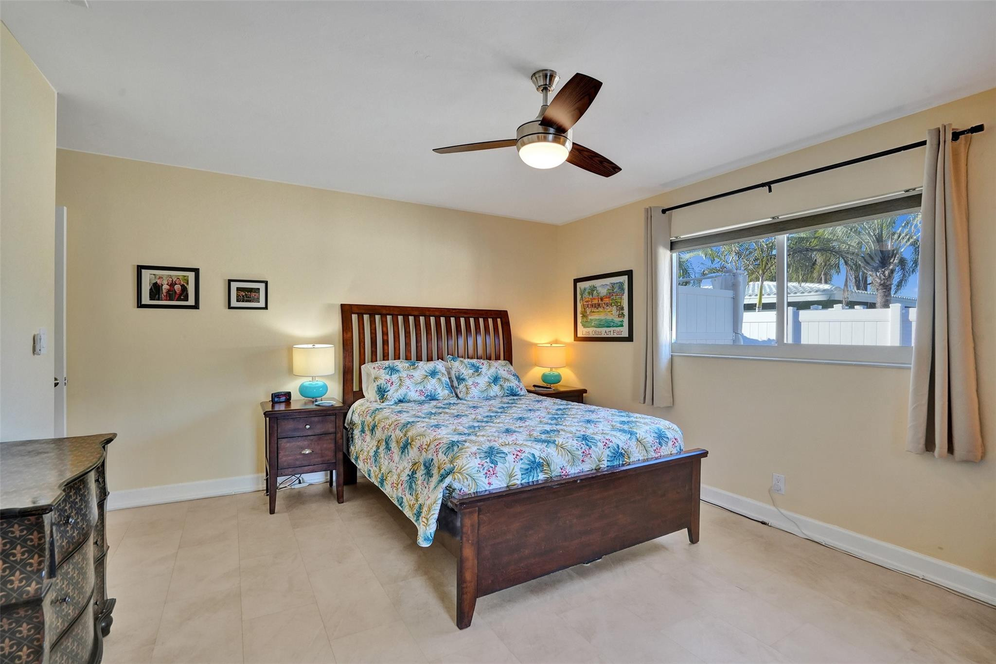 2585 Southeast 3rd Street Pompano Beach, FL 33062 - Photo 25 of 71 a bedroom with a bed and window