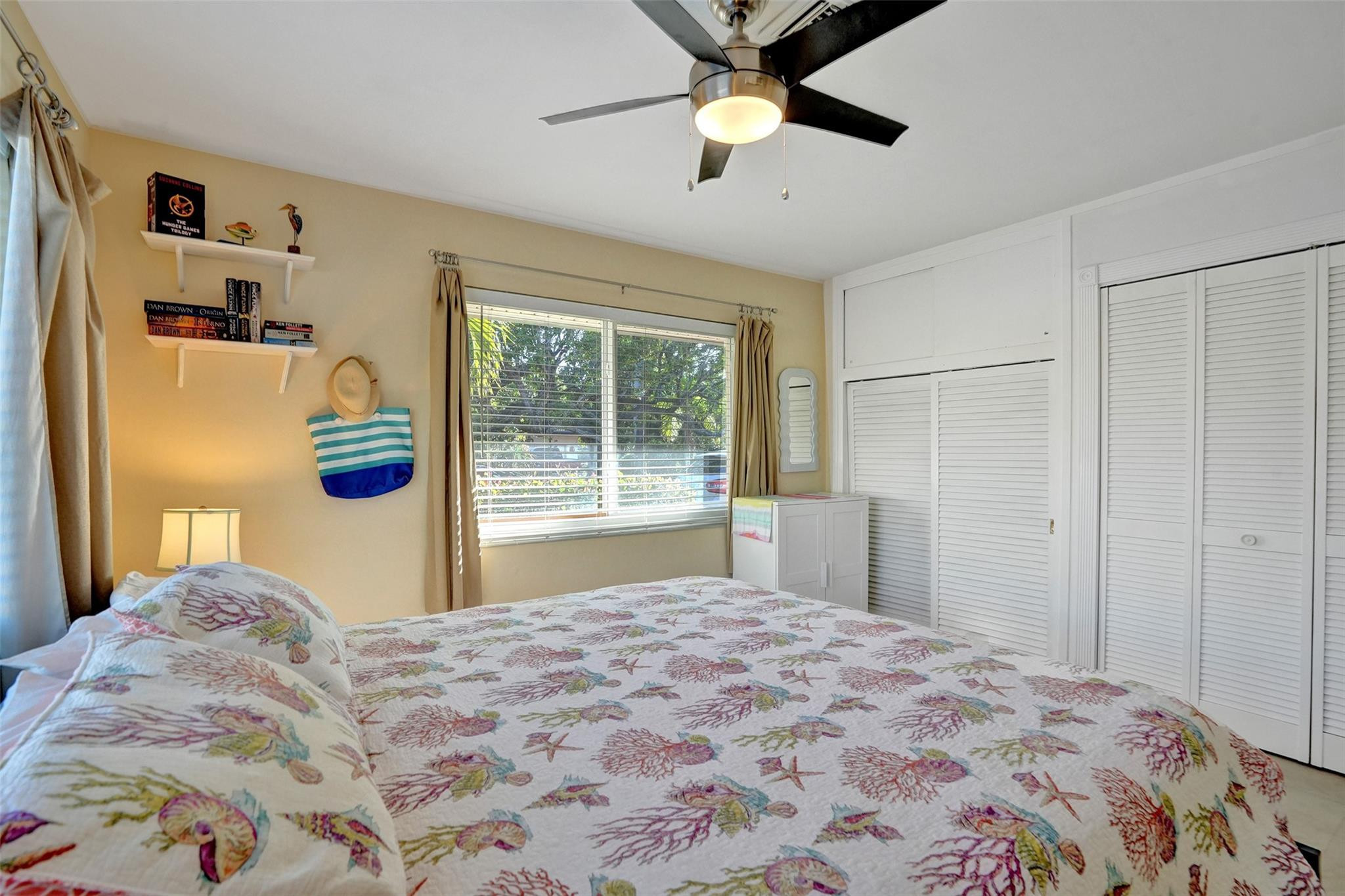 2585 Southeast 3rd Street Pompano Beach, FL 33062 - Photo 31 of 71 a bedroom with a large bed and a window