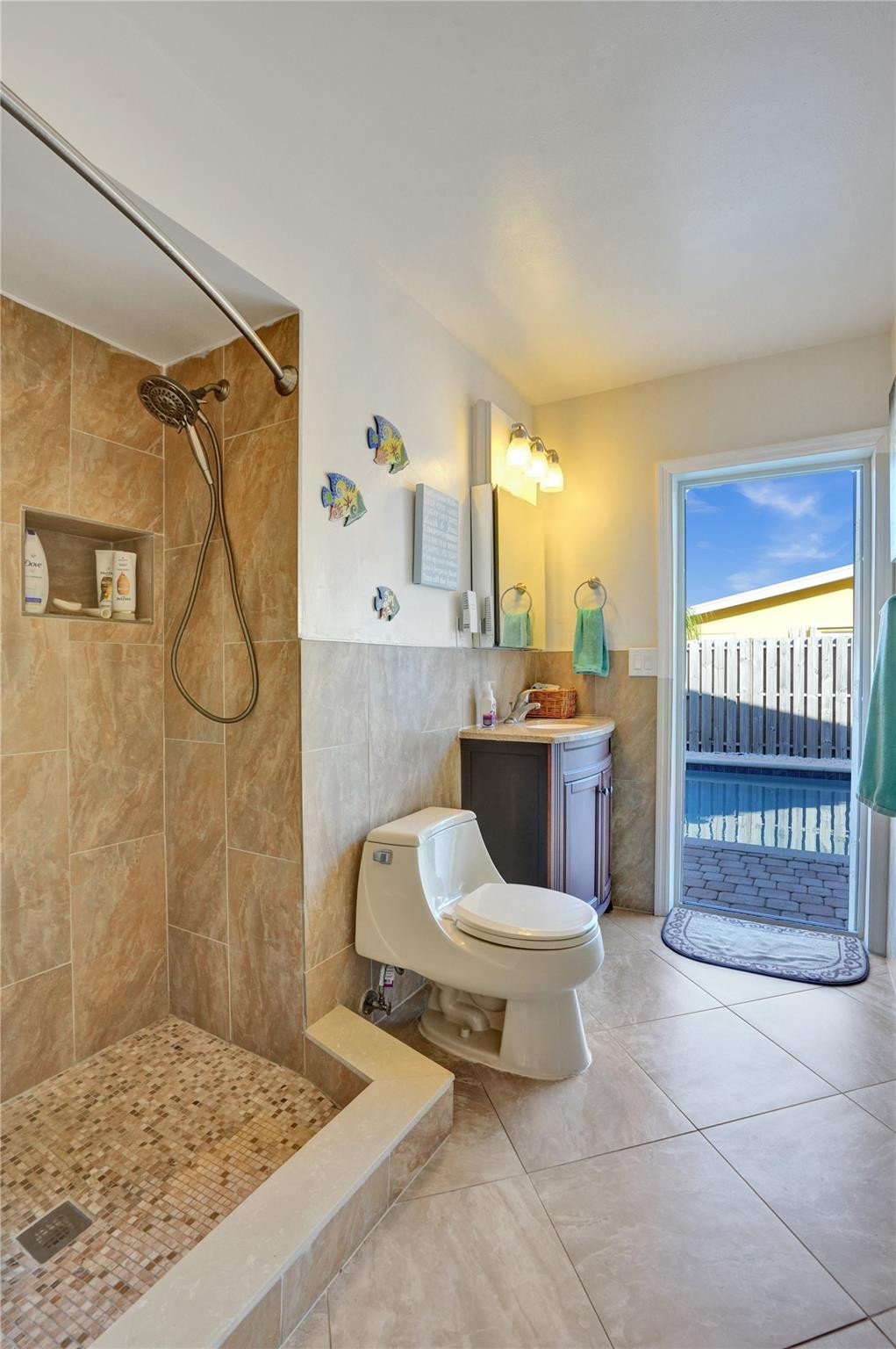 2585 Southeast 3rd Street Pompano Beach, FL 33062 - Photo 32 of 71 a bathroom with a toilet sink shower