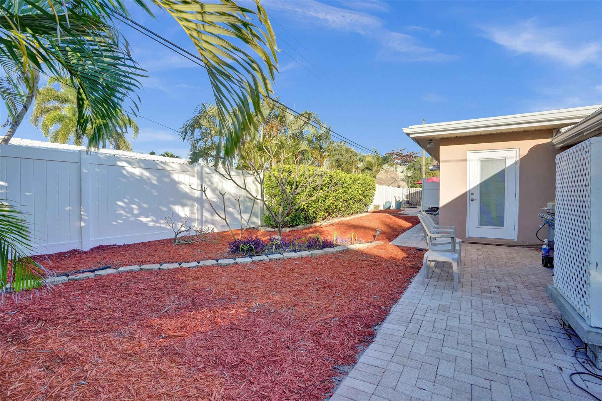 2585 Southeast 3rd Street Pompano Beach, FL 33062 - Photo 40 of 71 a backyard of a house with swimming pool in the back