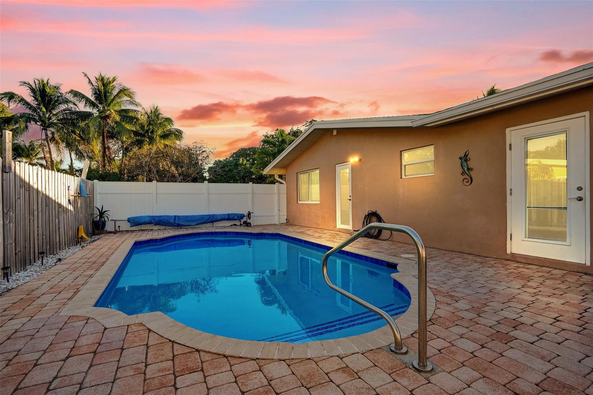 2585 Southeast 3rd Street Pompano Beach, FL 33062 - Photo 44 of 71 a backyard of a house with seating space