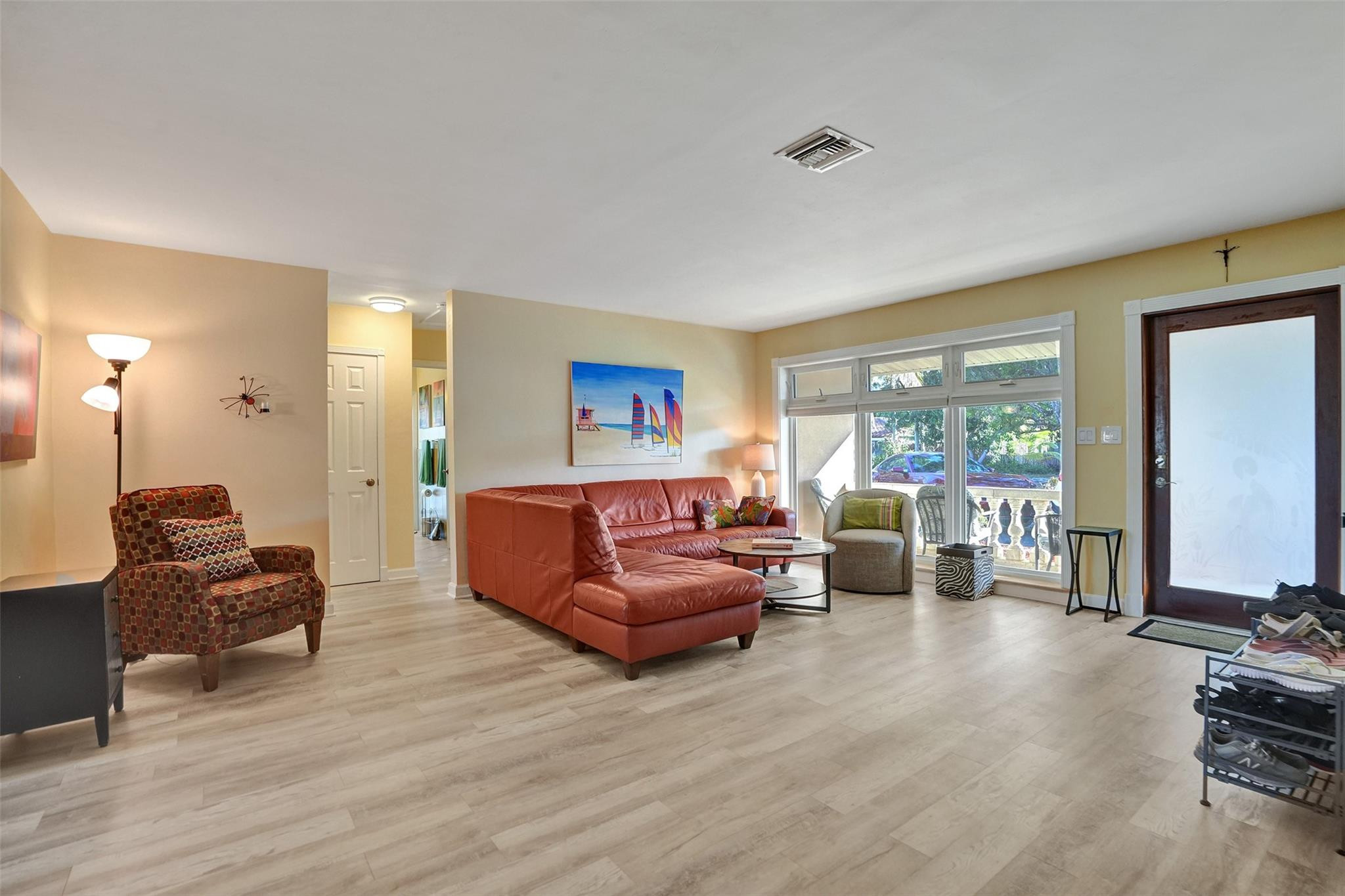 2585 Southeast 3rd Street Pompano Beach, FL 33062 - Photo 5 of 71 a living room with furniture window and wooden floor