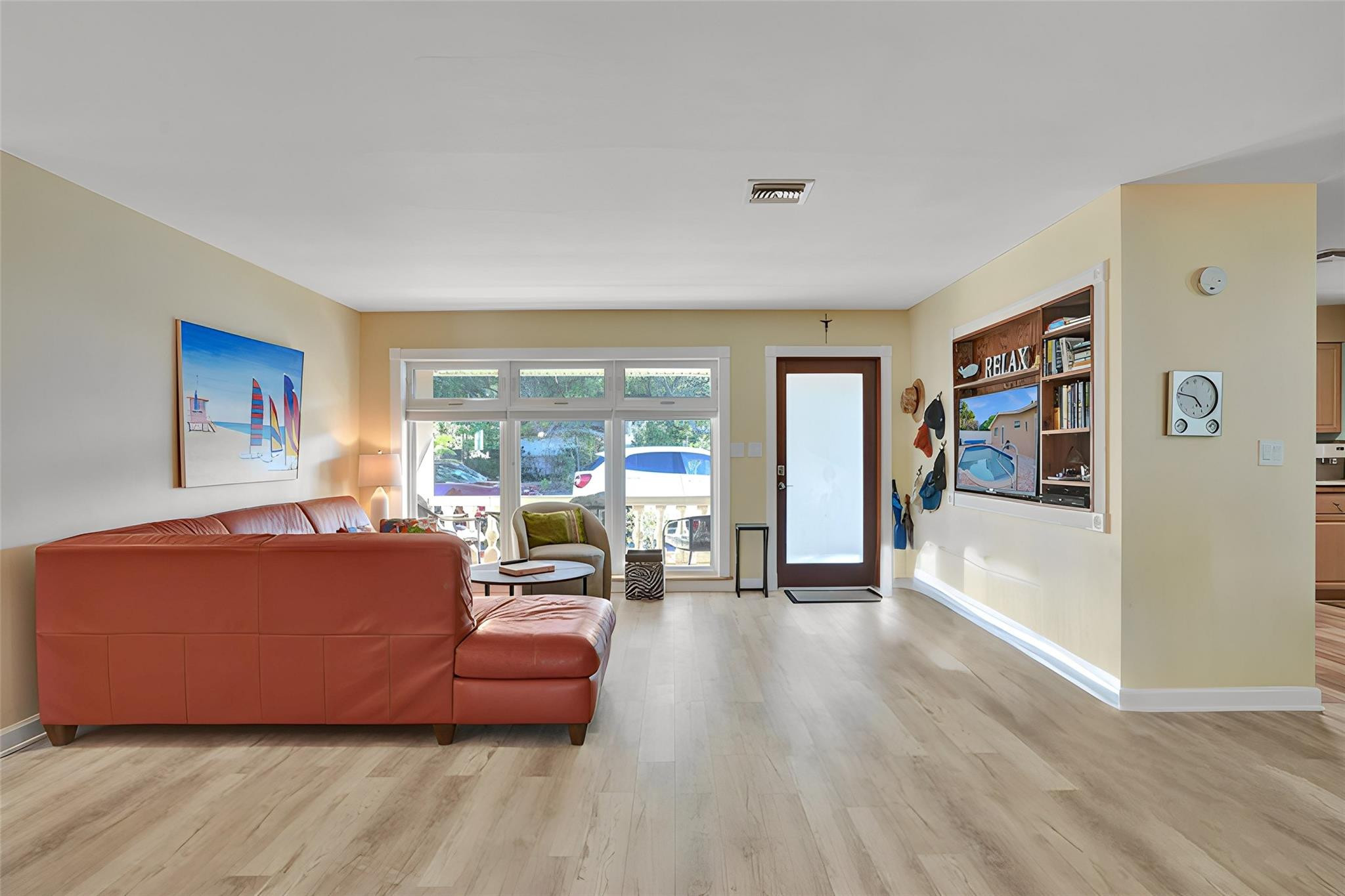 2585 Southeast 3rd Street Pompano Beach, FL 33062 - Photo 6 of 71 a living room with furniture and large window