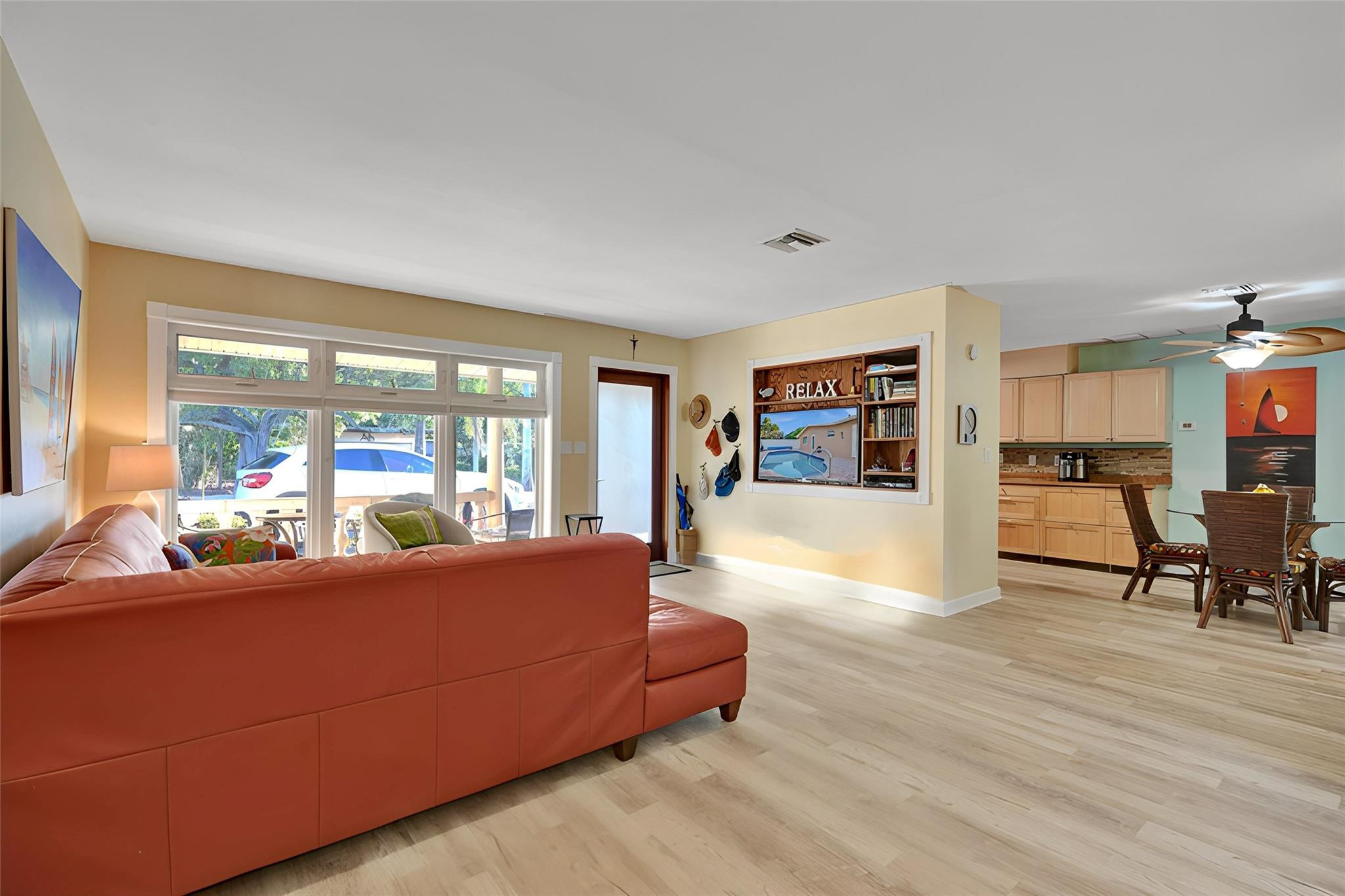 2585 Southeast 3rd Street Pompano Beach, FL 33062 - Photo 7 of 71 a living room with furniture and a large window