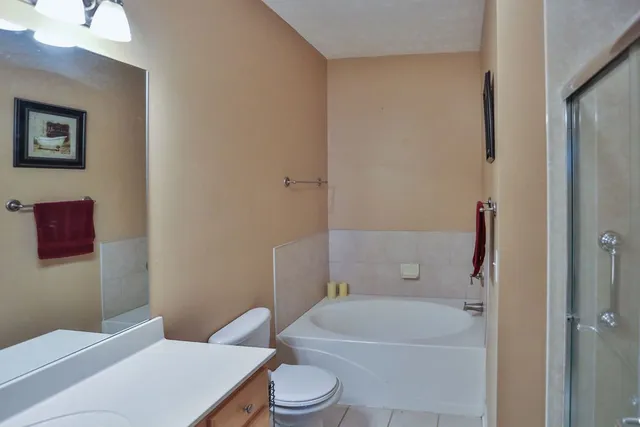 a bathroom with a toilet and a sink