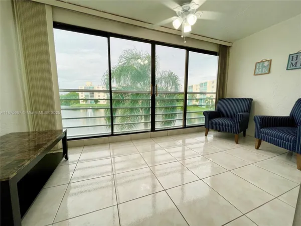 a living room with a large window