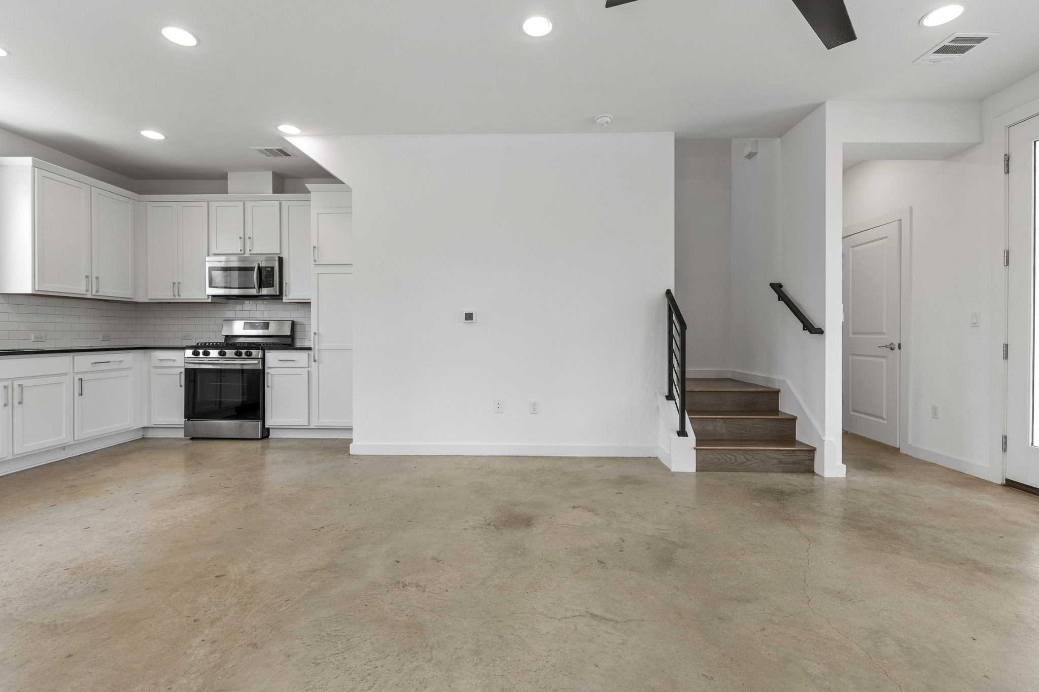2604 Wheless Lane, Unit 1 Austin, TX 78723 - Photo 9 of 38 Open layout connects seamlessly to living and dining areas for flow and connectivity.