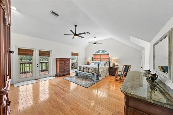 a view of outdoor space with deck and trees