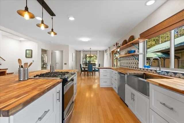 a view of an entryway with wooden floor