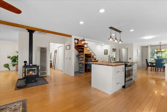 a bedroom with a bed and a table