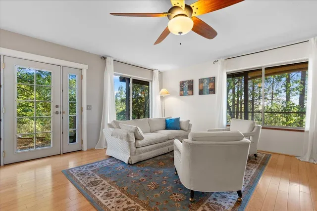 a spacious bathroom with a sink and mirror