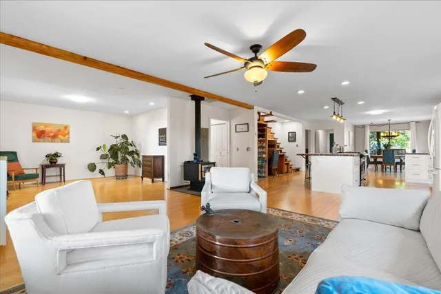 a living room with furniture and a rug