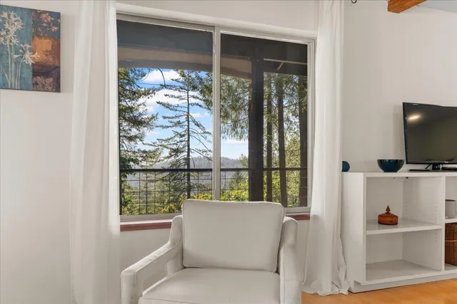a bathroom with a sink a mirror and shower