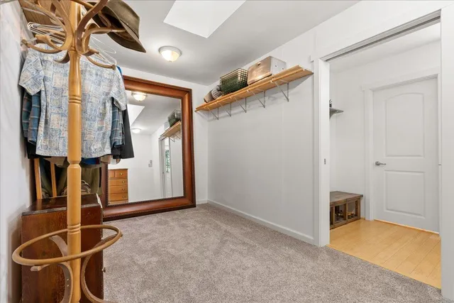 a view of balcony with wooden floor and fence