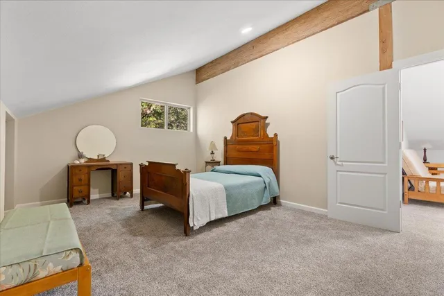 a view of a tree with a yard