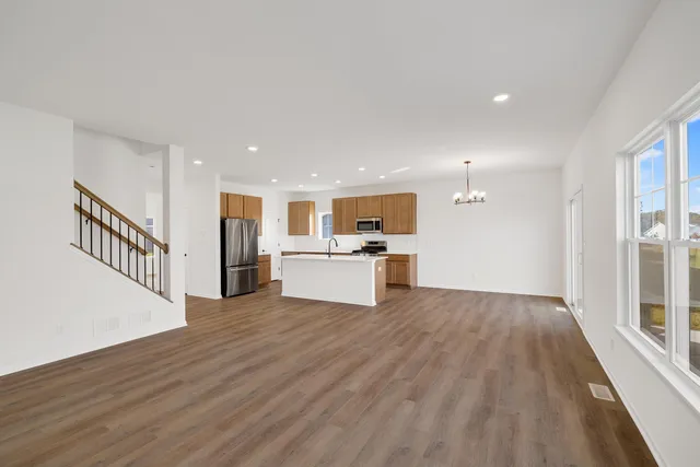 a view of kitchen with wooden floor