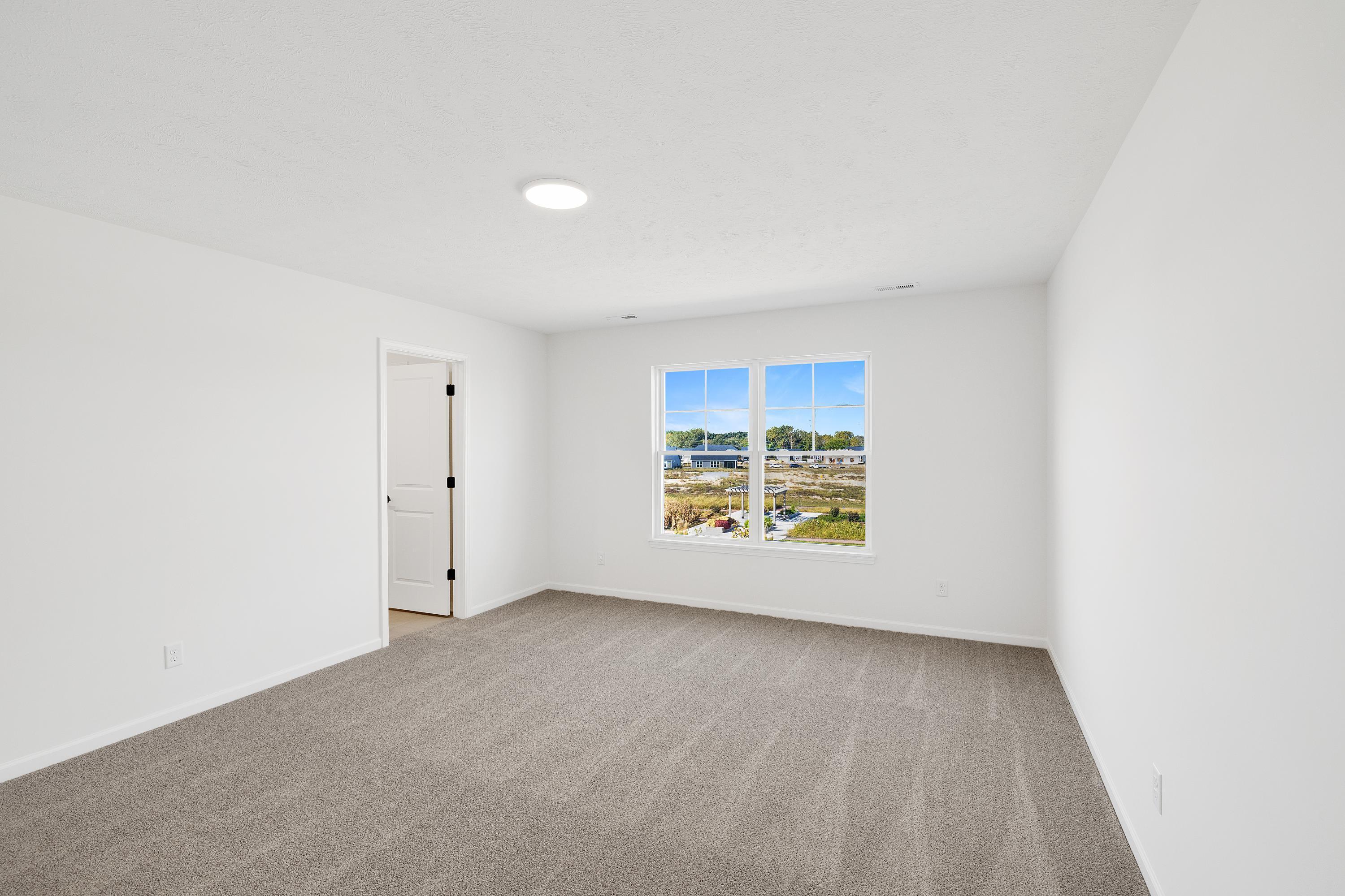 3980 Riverwood Road Valparaiso, IN 46385 - Photo 23 of 28 an empty room with a window