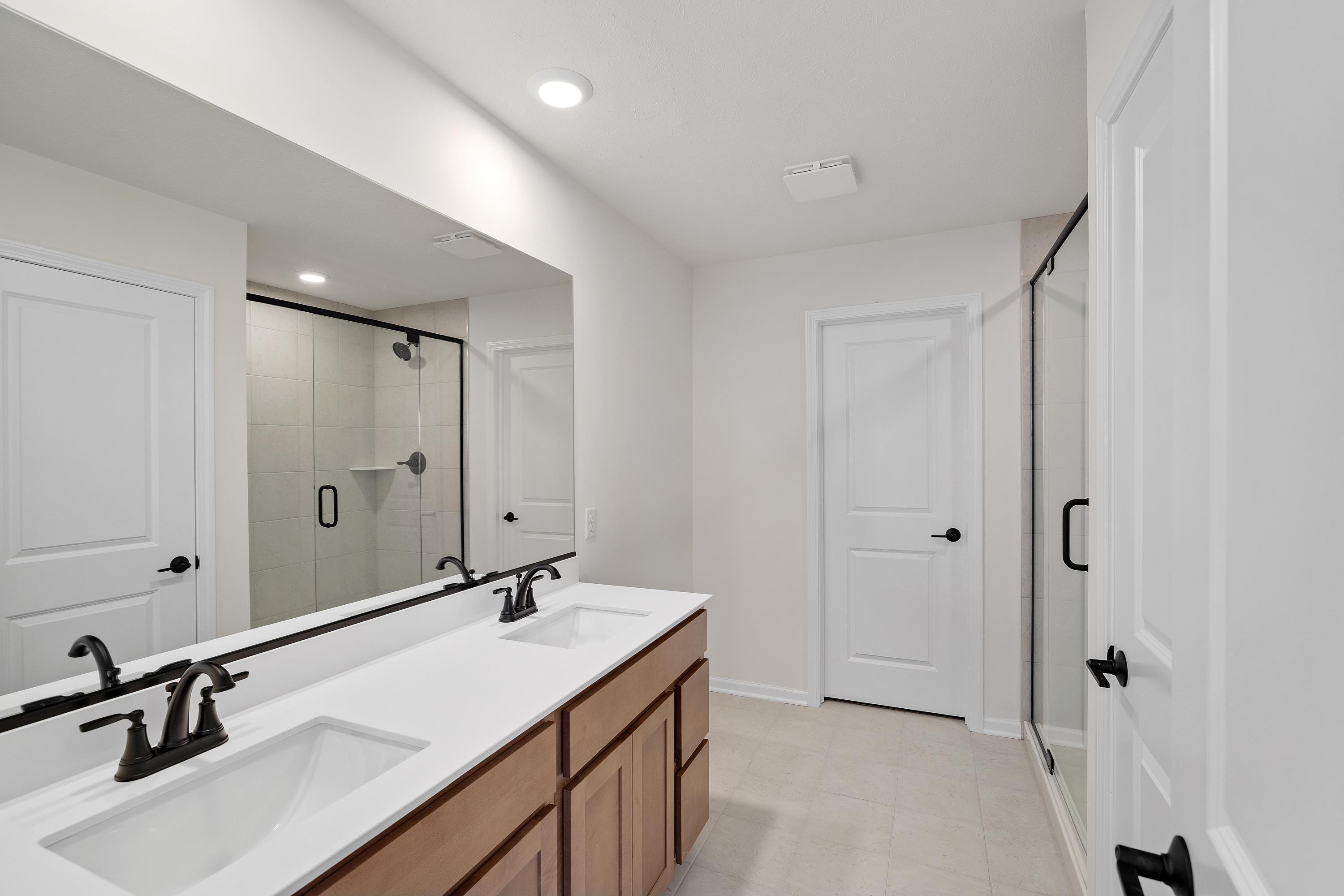3980 Riverwood Road Valparaiso, IN 46385 - Photo 24 of 28 a bathroom with a sink and a mirror