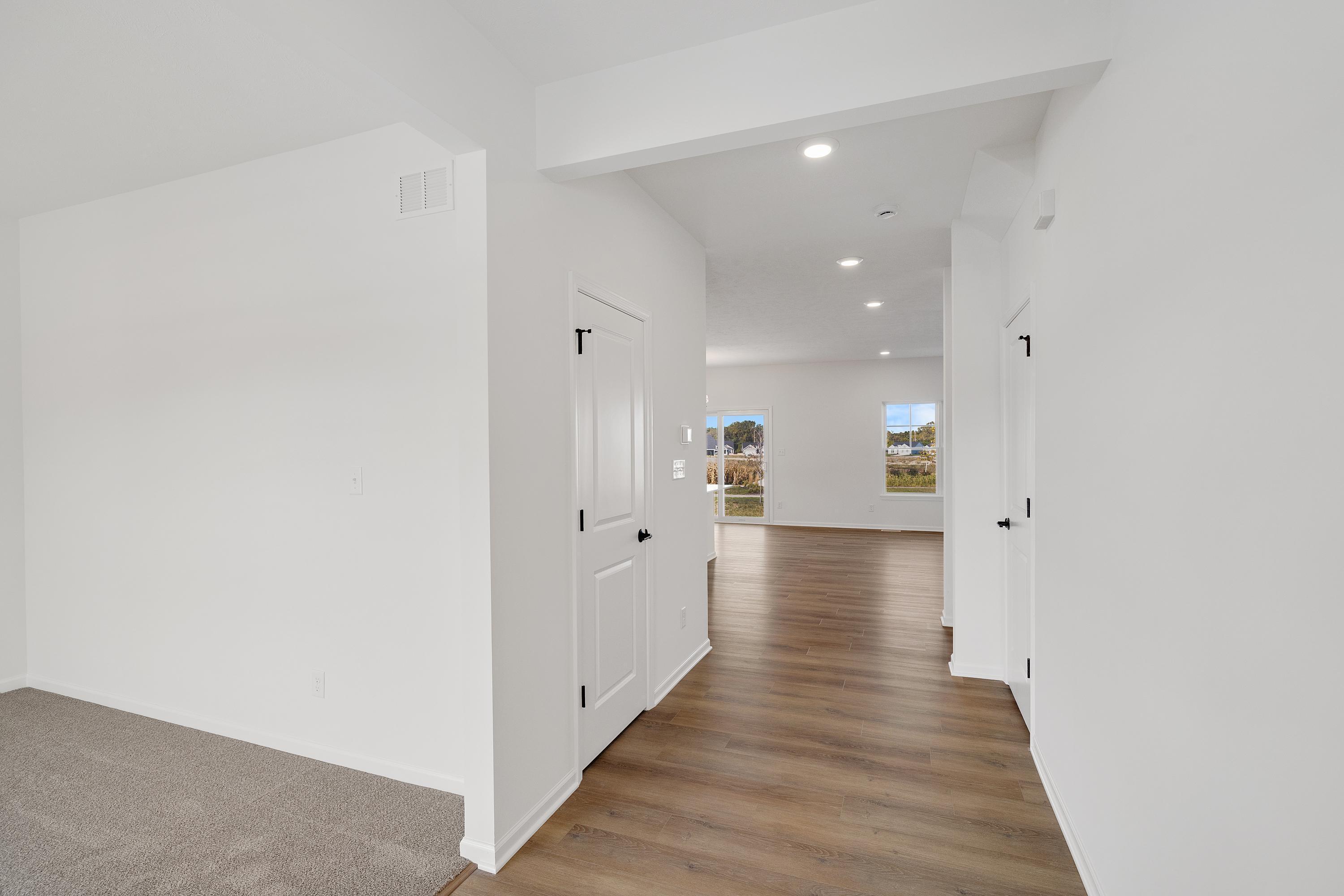 3980 Riverwood Road Valparaiso, IN 46385 - Photo 4 of 28 a view of a hallway with wooden floor
