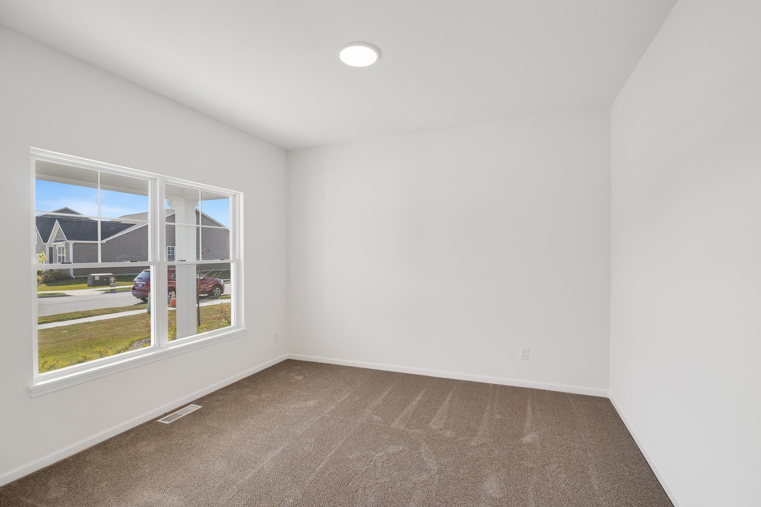 3980 Riverwood Road Valparaiso, IN 46385 - Photo 5 of 28 an empty room with a window
