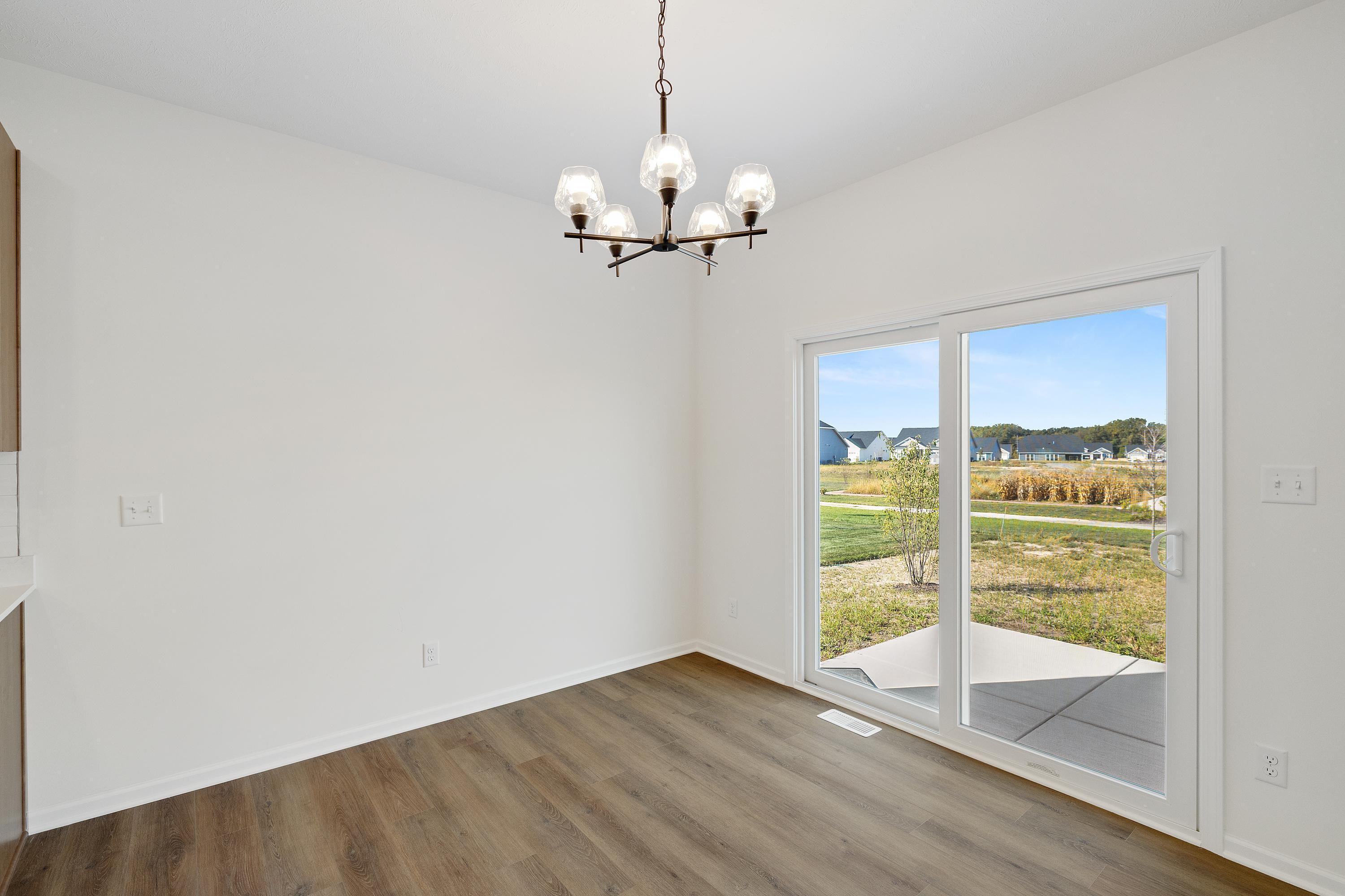 3980 Riverwood Road Valparaiso, IN 46385 - Photo 9 of 28 a view of an empty room with a window