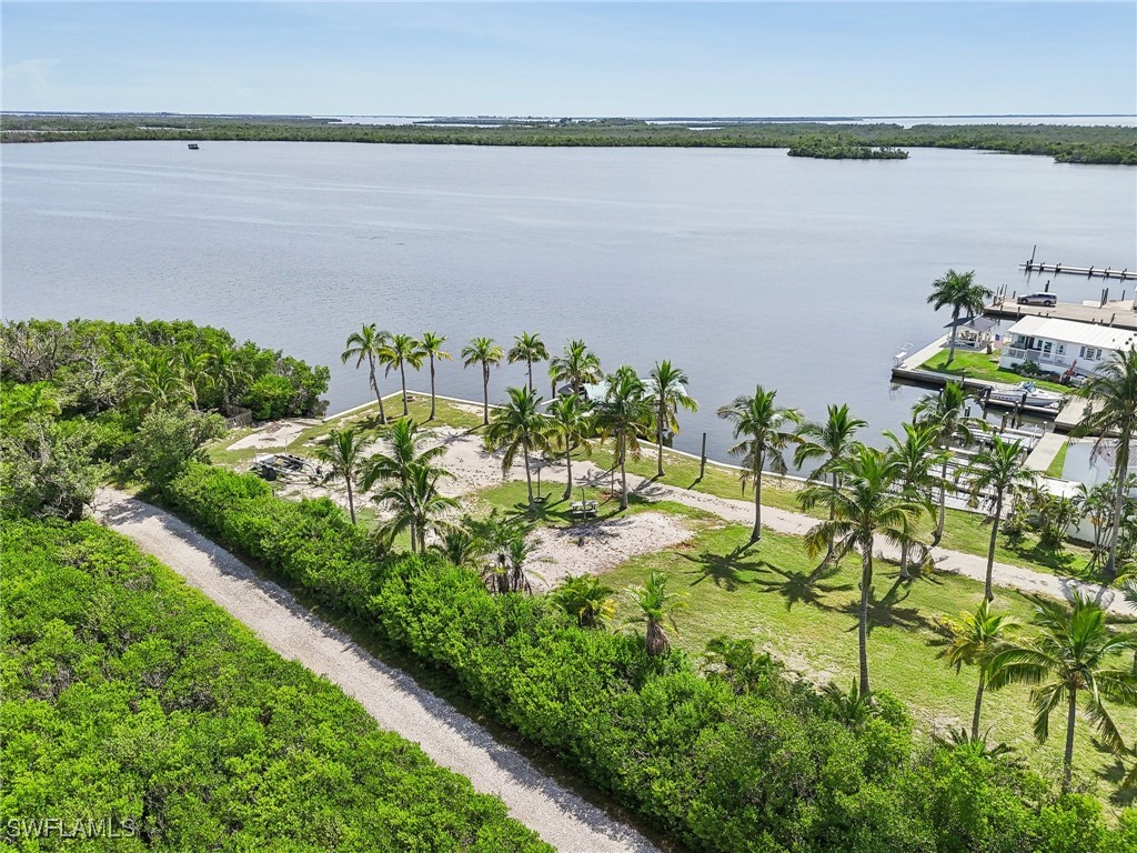 8335 Main Street Bokeelia, FL 33922 - Photo 46 of 47 a view of a lake with a lake in front of it