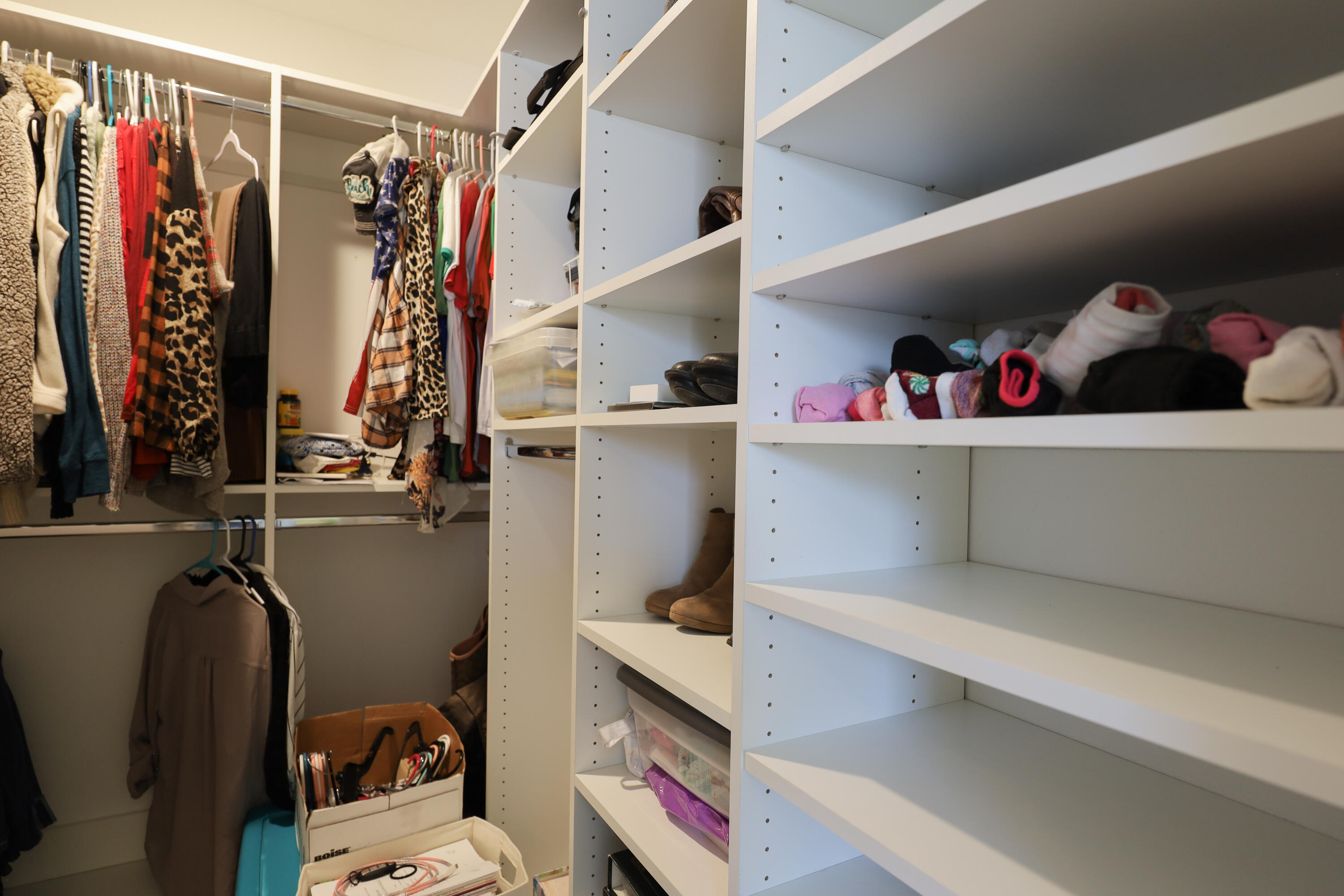 2896 Chancery Lane Crestview, FL 32539 - Photo 18 of 33 a view of walk in closet with clothes and shoes