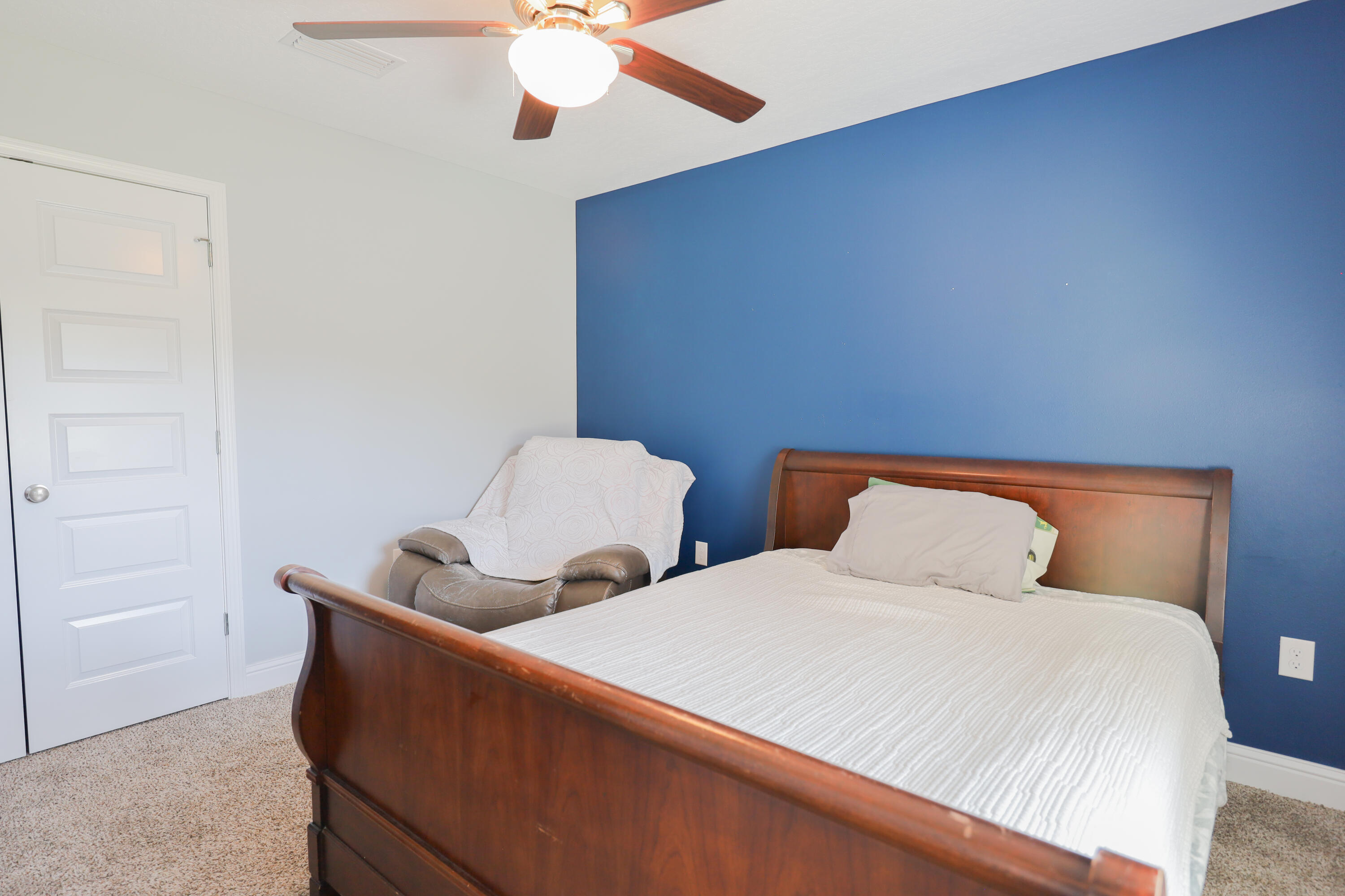 2896 Chancery Lane Crestview, FL 32539 - Photo 25 of 33 a bedroom with two beds and painted walls