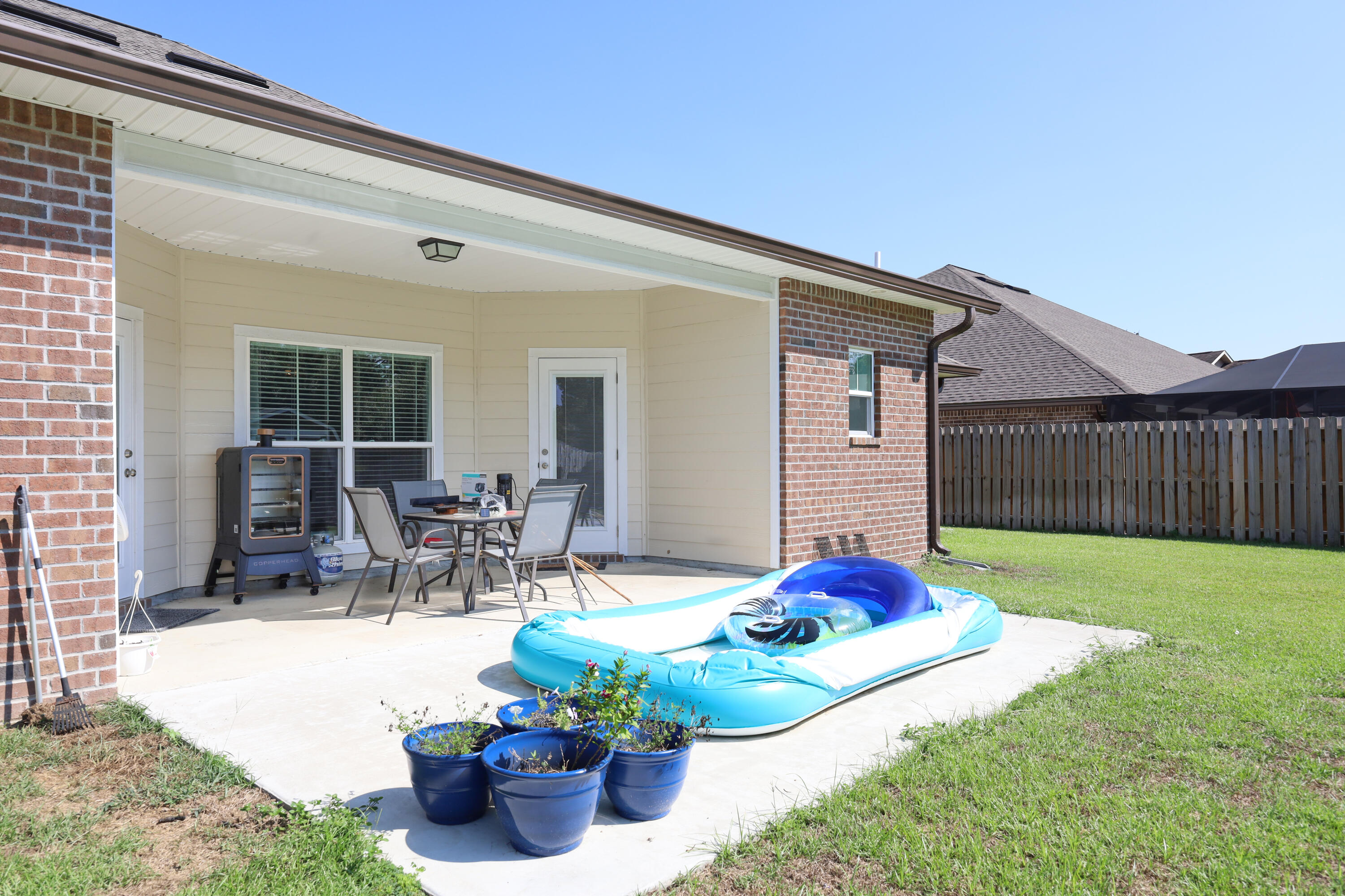 2896 Chancery Lane Crestview, FL 32539 - Photo 31 of 33 a front view of house with outdoor seating