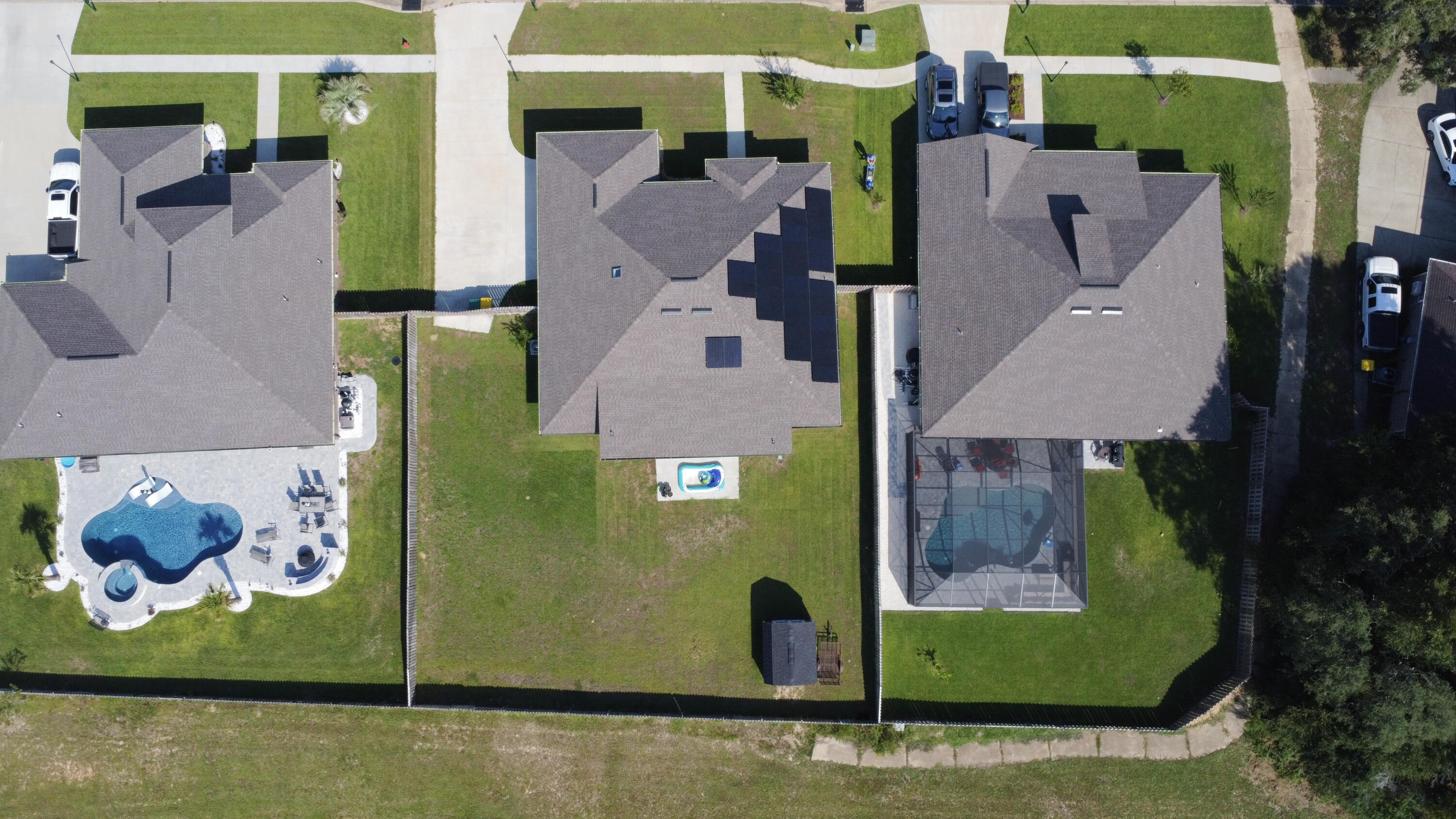 2896 Chancery Lane Crestview, FL 32539 - Photo 32 of 33 an aerial view of a house with a swimming pool
