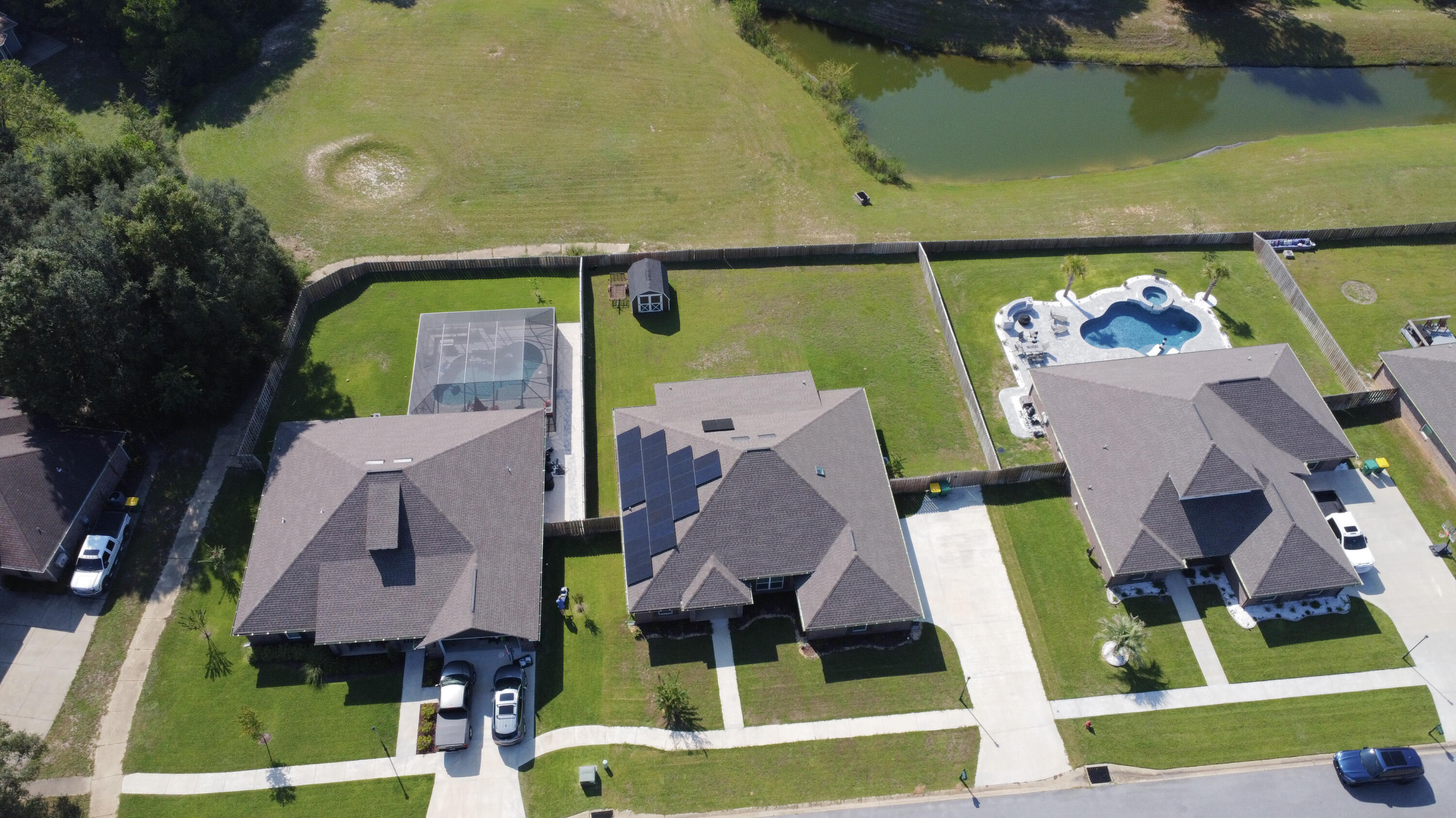 2896 Chancery Lane Crestview, FL 32539 - Photo 33 of 33 an aerial view of a house with a garden and pool