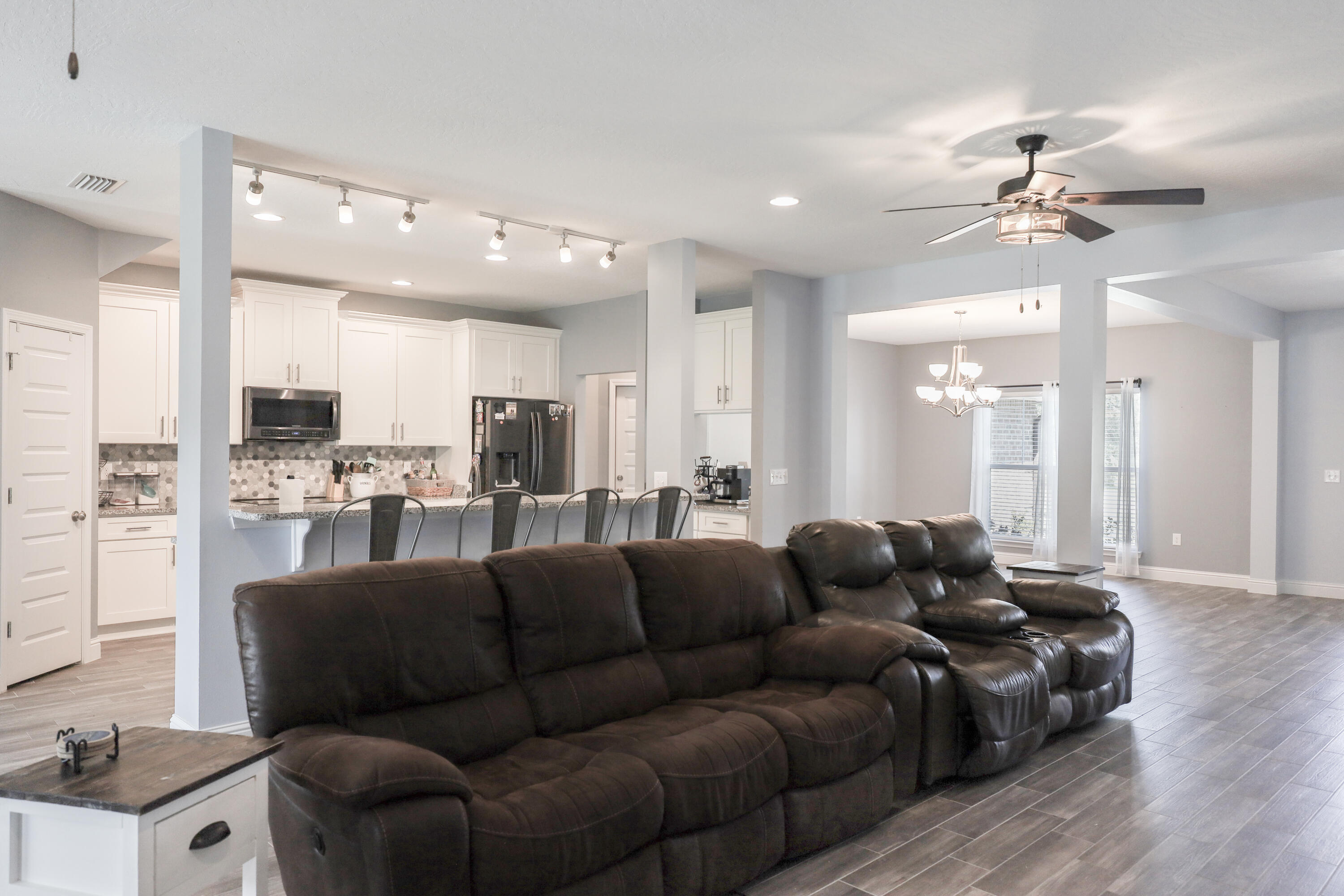 2896 Chancery Lane Crestview, FL 32539 - Photo 7 of 33 a living room with furniture and kitchen view