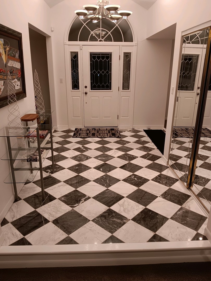 26824 South Winfield Road Monee, IL 60449 - Photo 8 of 42 a view of a entryway door of a house