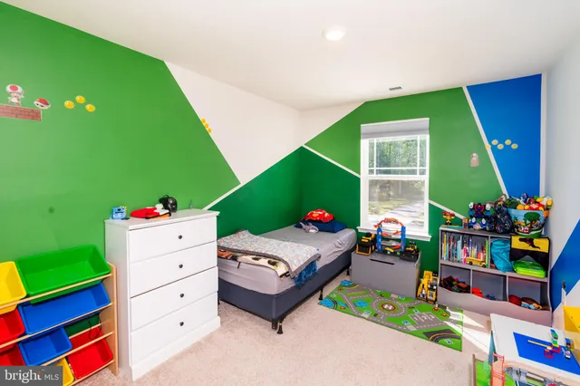 a kids room with toys and toys